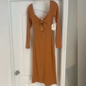 Altered state long sleeved dress. NWT
